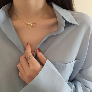 Collier ras du cou géométrique à double cercle