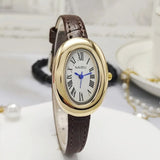 Détail du bracelet en cuir texturé d'une montre vintage femme