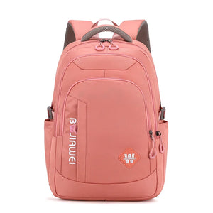 Sac à dos femme rose multifonction en nylon, idéal pour le style collégial et le rangement d'ordinateur.
