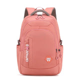 Sac à dos femme rose multifonction en nylon, idéal pour le style collégial et le rangement d'ordinateur.