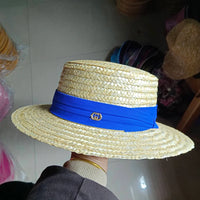 Chapeau en paille d'été à bord plat pour femme