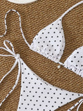 Bikini blanc à pois noirs, vue du haut et du bas séparés