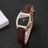 Montre femme élégante bracelet cuir noir cadran rond blanc chiffres arabes dorés