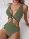 Maillot de bain une pièce imprimé floral, motif exotique et couleurs estivales