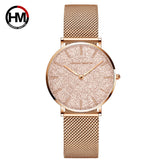 Montre femme Hannah Martin cadran blanc et bracelet maille milanaise doré