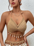 Haut de bikini en crochet beige clair avec détails ajourés et coquillages