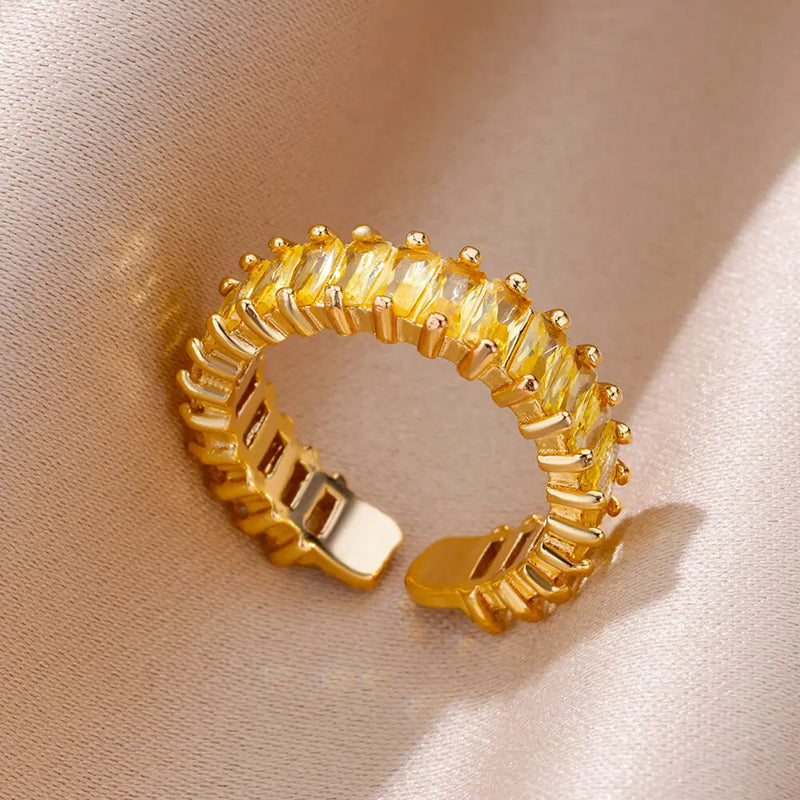Bague dorée ajustable avec rangée de zircons jaunes rectangulaires Emakujitia