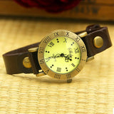 Montre vintage bohème en cuir marron foncé avec cadran crème et chiffres romains