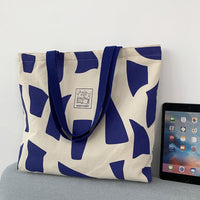 Retro-style canvas bag with geometric patterns