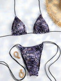 Photo d'ensemble d'un bikini triangle blanc uni avec liens à nouer