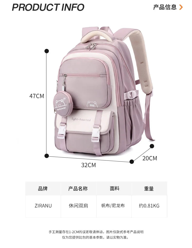 Sac à dos scolaire en nylon rose avec dimensions, poches pratiques et design unique pour enfants.