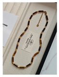 Collier Ras du Cou Élégant en Perles Tubulaires et Pierres Naturelles