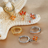 Boucles d'oreilles pendantes zircon avec motif fleur
