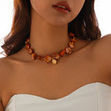 Collier bohème avec pendentif étoile de mer et coquillages blancs, vue rapprochée