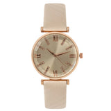 Montre femme bracelet cuir blanc, cadran blanc chiffres romains dorés et strass, sur fond blanc