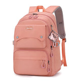 Sac à dos femme en nylon rose multifonction pour voyage et travail avec fermeture éclair.