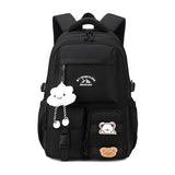 Sac à dos noir femme en nylon avec motifs kawaii et grande capacité, idéal pour le style collège japonais.