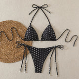 Bikini micro noir à pois blancs, design triangle et liens à nouer