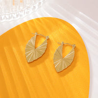 Boucles d'oreilles pendantes dorées