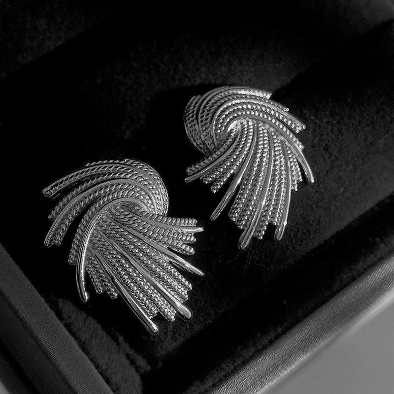 Boucles d'oreilles en métal en forme torsadé - EMAKUJITIA