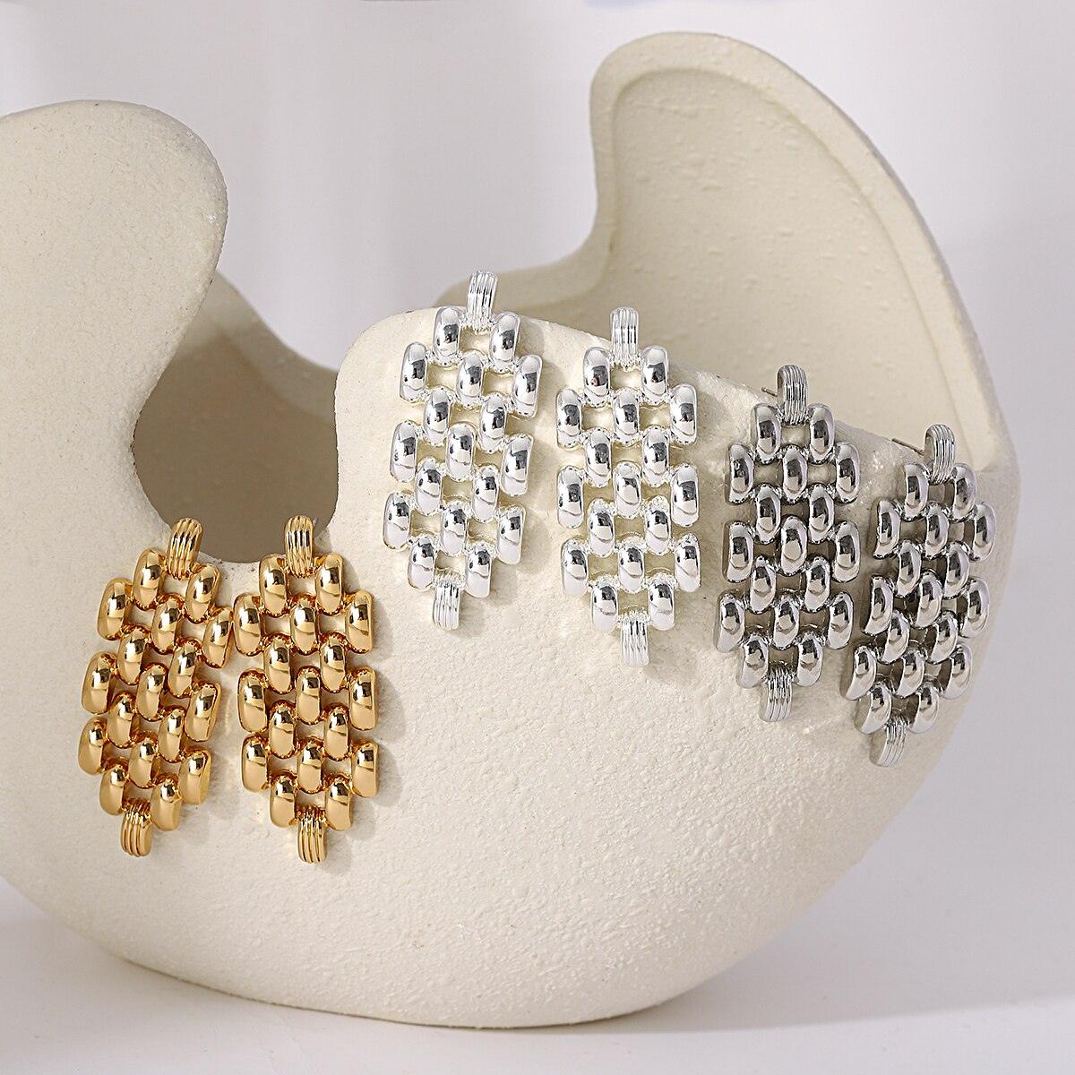 Boucles d'oreilles en métal motif deisgn unique pour femmes - EMAKUJITIA