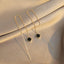 Long dangling earrings with black square pendant