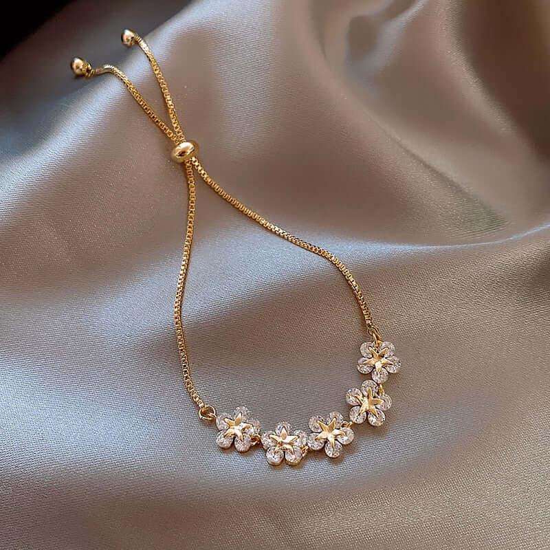 Bracelet ajustable motif fleur serti de cristaux de zircon - EMAKUJITIA