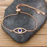 Bracelet ajustable motif œil serti de cristaux de zircon - EMAKUJITIA