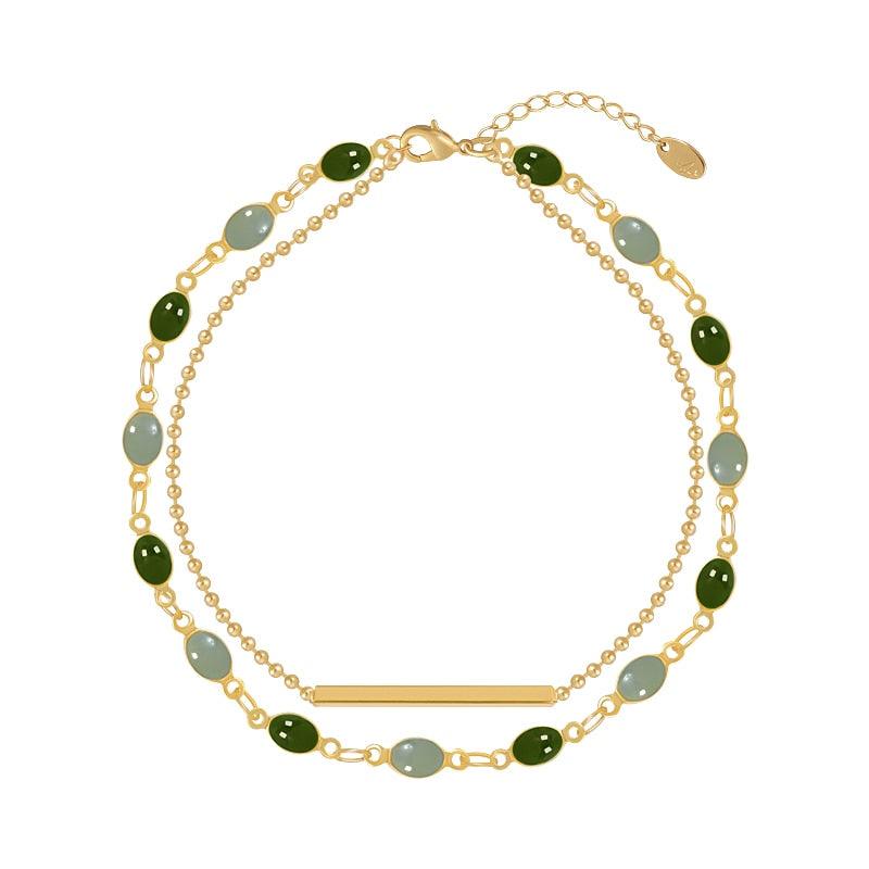 Bracelet double chaînes serti de perles vertes - EMAKUJITIA