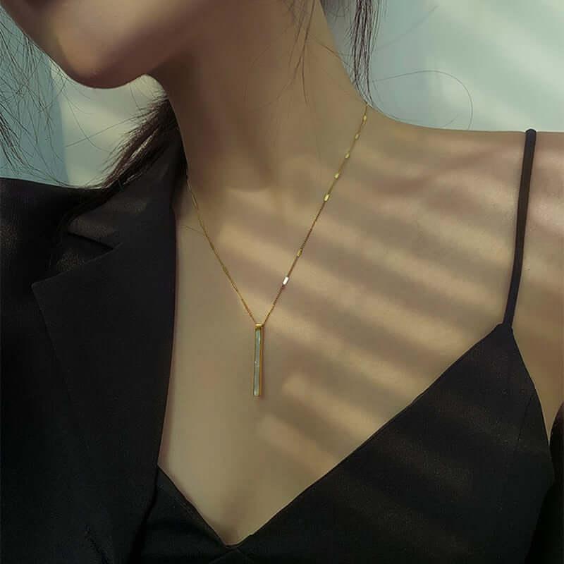 Collier à pendentif long en acier pour femmes - EMAKUJITIA