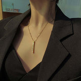 Collier à pendentif long en acier pour femmes - EMAKUJITIA