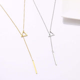 Collier double pendentif triangle ajouré et baguette - EMAKUJITIA