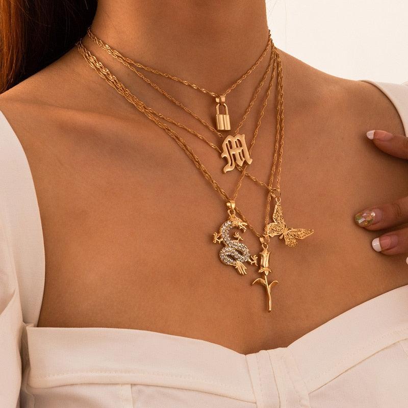 Ensemble de cinq colliers avec pendentifs doré et en cristal pour femmes - EMAKUJITIA