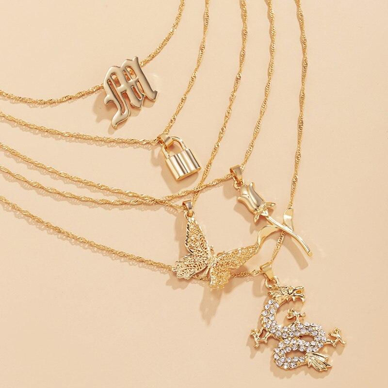 Ensemble de cinq colliers avec pendentifs doré et en cristal pour femmes - EMAKUJITIA