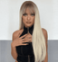 Long blonde wig with synthetic bangs