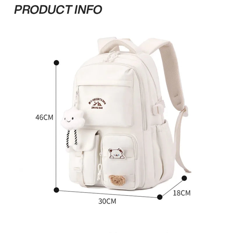 Sac à dos femme en nylon blanc avec pendentif, idéal pour les étudiantes, dimensions 46x30x18 cm.