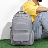 Un sac à dos multicouche imperméable et élégant Oxford grande capacité Simple banlieue hors sol étudiant sac à dos