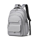 Un sac à dos multicouche imperméable et élégant Oxford grande capacité Simple banlieue hors sol étudiant sac à dos