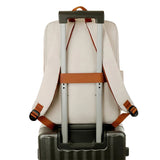 Intérieur du sac à dos montrant le compartiment pour ordinateur portable et les poches de rangement