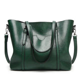 Sac à main femme en similicuir couleur vert émeraude, vue de face