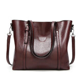 Sac à main femme en similicuir couleur bordeaux, vue de face