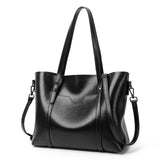Sac à main femme en similicuir couleur noir, vue de trois quarts