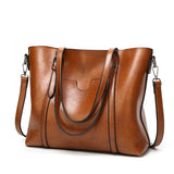 Sac à main femme en similicuir couleur marron clair, vue de face