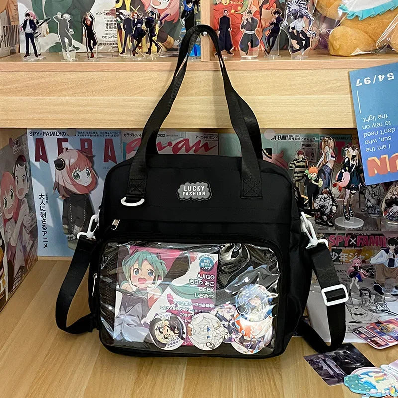 Sac bandoulière Y2K Itabag noir avec fenêtre transparente et badges d'anime