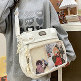 Sac bandoulière Itabag noir porté par une femme en tenue décontractée