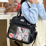 Vue de côté d'un sac bandoulière Itabag noir, montrant sa capacité