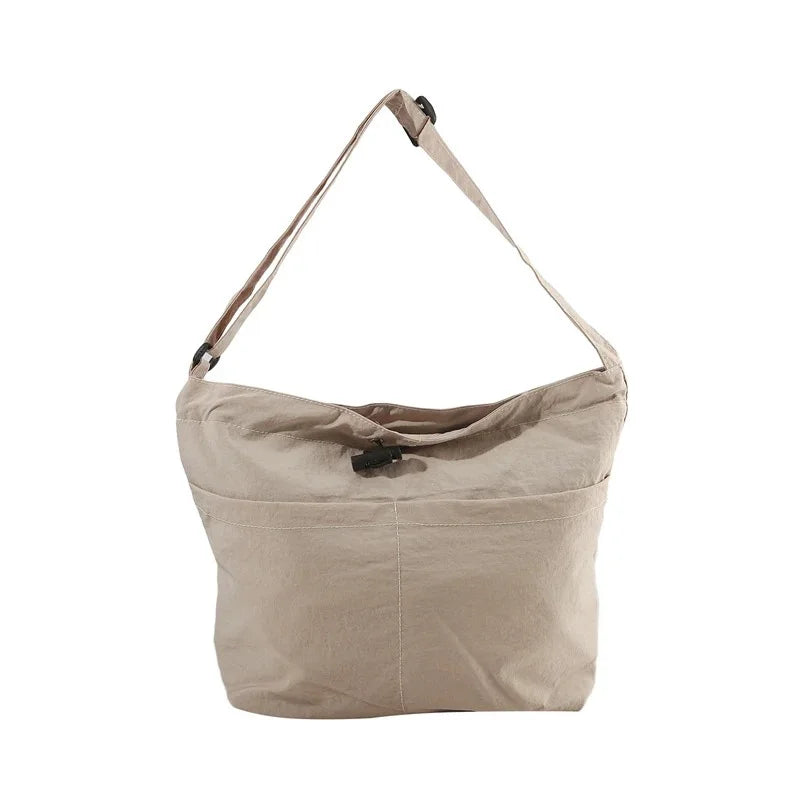 Sac bandoulière femme beige avec bandoulière et poches latérales