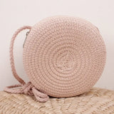 Sac bandoulière femme rond en paille tressée style bohème chic