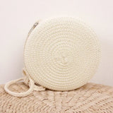 Sac bandoulière femme rond en paille tressée style bohème chic