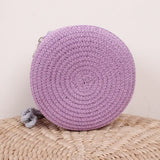 Sac bandoulière femme rond en paille tressée style bohème chic